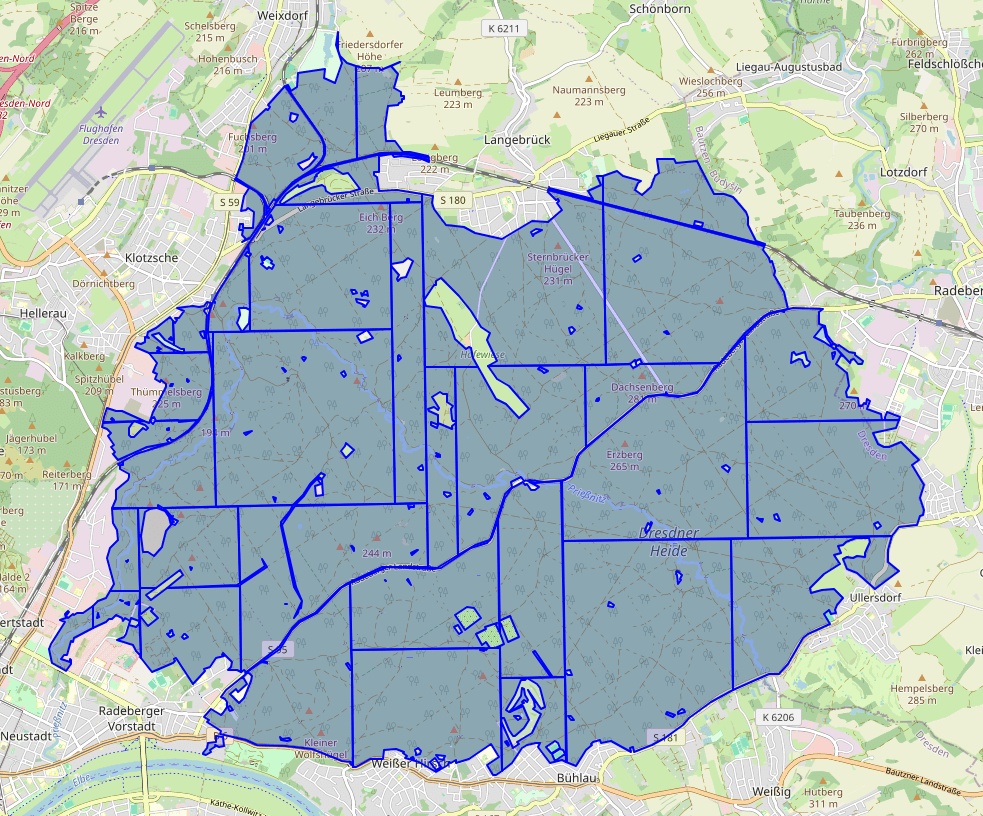 Beispiel für das Ergebnis einer Anwendung von ST_Subdivide() auf ein Polygon, Aufteilungen einer farbig gefüllten Stadtfläche